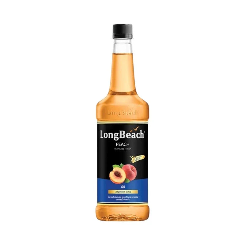LongBeach Zero Calories Peach Syrup bottle in dry grocery aisle, showcasing clear label and peach flavor branding.