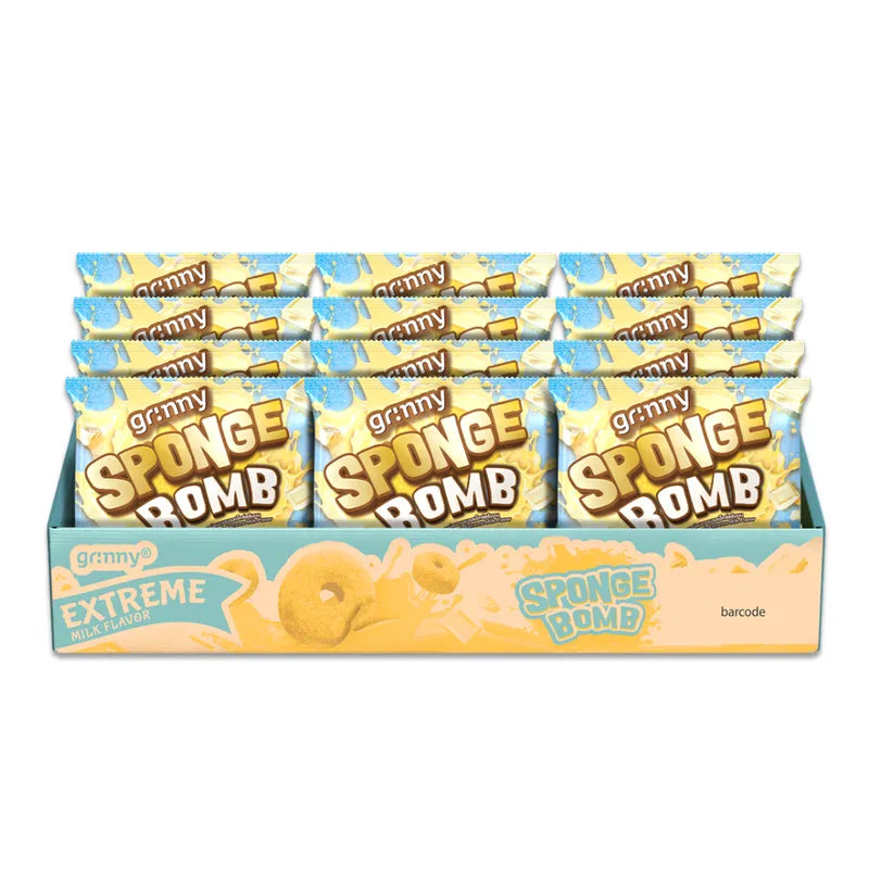 Grinny Sponge Bomb Snack Extreme Milk flavor 15g, a dry grocery confectionery snack with soft sponge texture and creamy milk flavor.