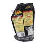Pure Foods extra hot glazing sauce in 1kg container, showcasing vibrant red chili and glossy texture for flavorful glazing.