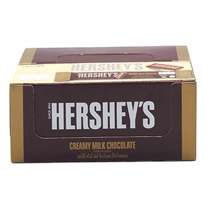 HERSHEY'S creamy milk chocolate candies, 15g each, arranged in a pack of 24 for dry grocery consumption.