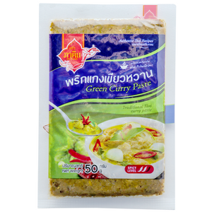 Kruaphakhin Green Curry Paste in a jar, featuring vibrant green color and fresh ingredients, ideal for Thai cooking.
