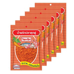 THAIDERM Thaiderm Pladukfu Chili Flakes 22g, close-up of six packaged dry grocery chili flake containers with red chili flakes inside.