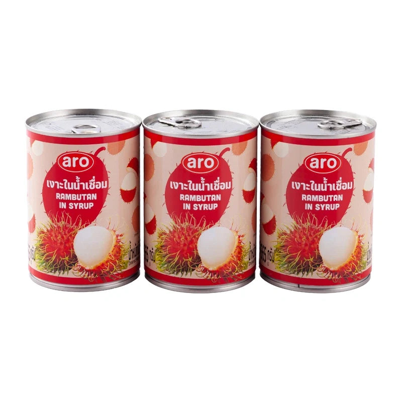 Cans of ARO Rambutan in syrup, 565g each, stacked together, showcasing the fruit and syrup inside the ARO brand dry grocery product.