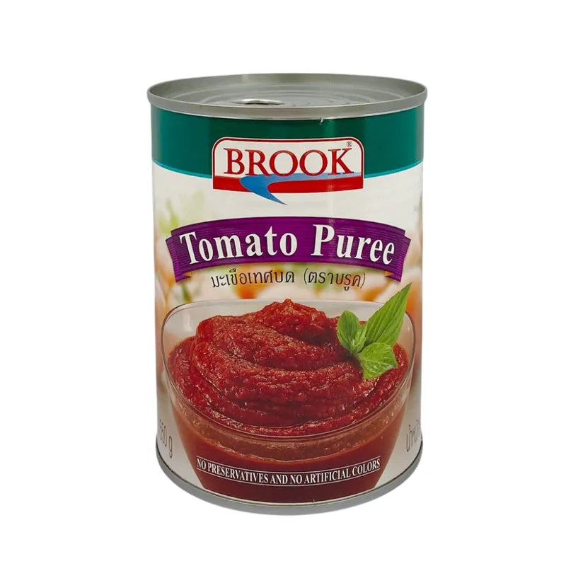 Brook Tomato Puree 550g jar with a label, showcasing bright red tomato puree inside, ideal for cooking and sauces.