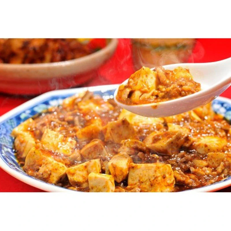 House Mabo Tofu Nikunashi Mild 150g dry grocery package with tofu and vegetables in a bowl, ready for cooking or serving.