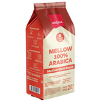 Aroma Mellow Arabica roasted coffee drink in a glass cup, showcasing rich dark coffee with a smooth, inviting appearance.