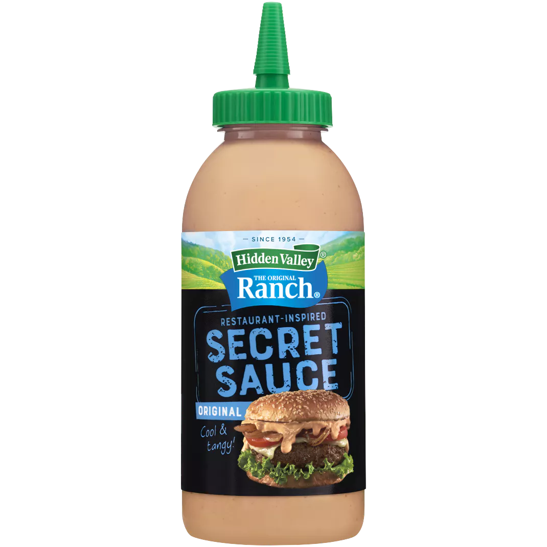 Bottle of Hidden Valley Burger Secret Sauce with label visible, designed for enhancing burgers and sandwiches.