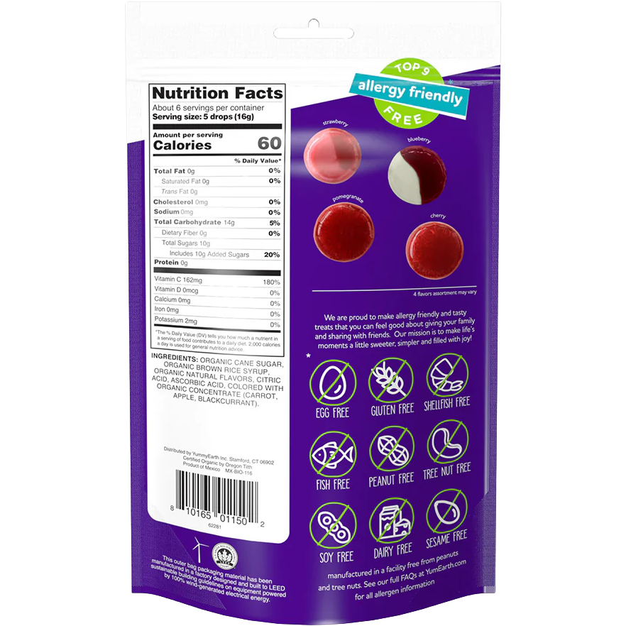 YumEarth Organic Vitamin C Fruit Drops candies in colorful package, showcasing vibrant fruit-shaped confectionery snacks.