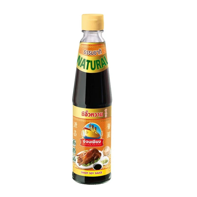 Nguan Chiang Sweet Soy Sauce 415g bottle, close-up of the dark, glossy soy sauce in a clear glass container.