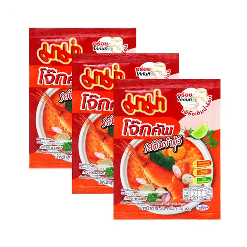 Mama Jok Tom Yum Kung dry grocery packets featuring authentic Thai flavor in convenient instant cup packaging.