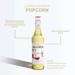 Monin Popcorn Syrup 700ml bottle, ideal for flavoring popcorn, desserts, and beverages in dry grocery category.