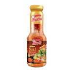 Bottle of Tonson Pine Suki Sauce from Tonson Dry Grocery range, featuring a label with pine and Asian flavor elements.