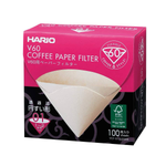 Hario V60 Paper Filter 01 W for pour-over coffee brewing, showing white paper filters stacked and ready for use.