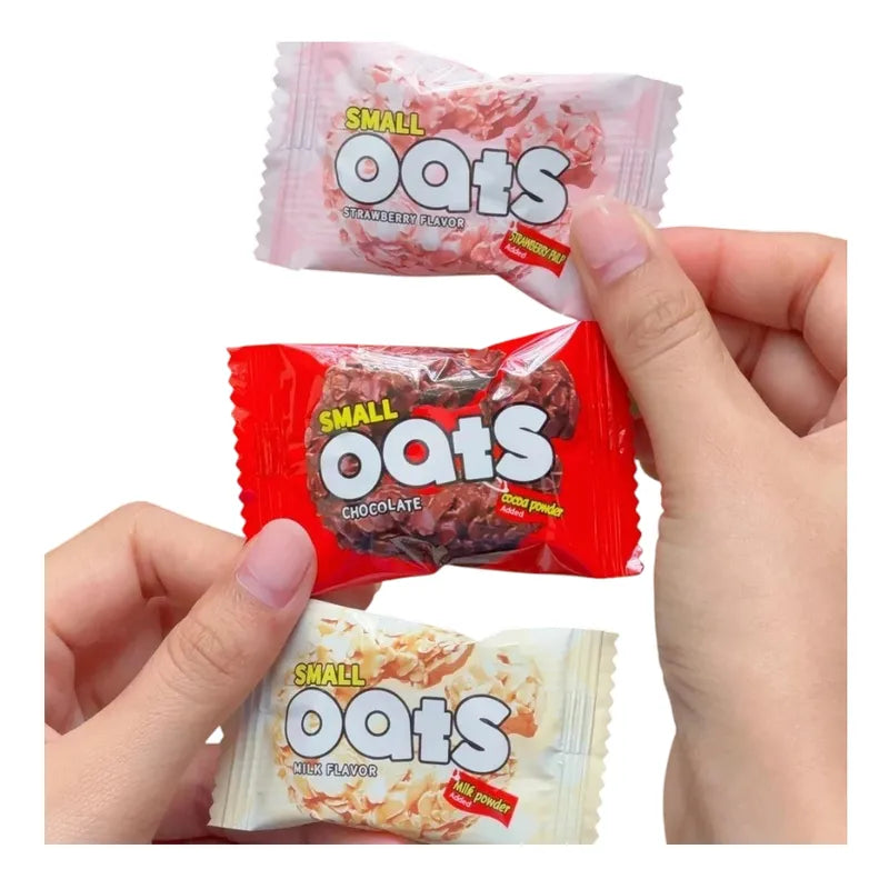 Nezline oat ring snack coated with chocolate milk, showing a close-up of the crunchy, oat-filled confectionery treat.