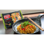 Spicy Thai Basil Chicken instant noodle pack by Domin Mie with colorful packaging, showcasing the flavor and brand.