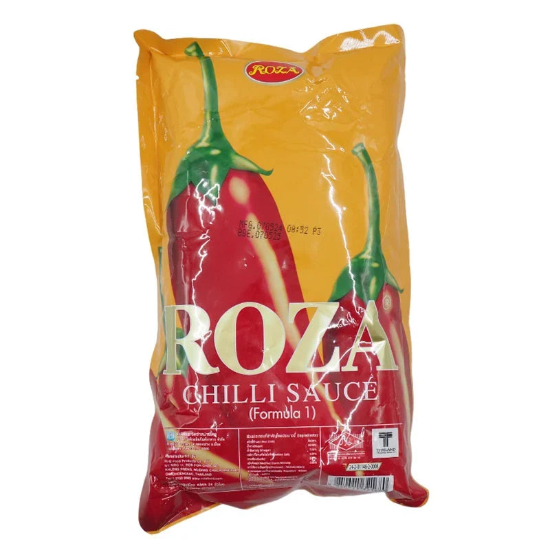 Roza Chili Sauce 1kg bottle from the dry grocery section, showing the spicy chili sauce in a clear plastic bottle.