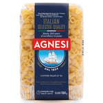 Agnesi Chifferi Rigati pasta N50, Italian grocery product, uncooked pasta with ridged, twisted shape in a clear bowl