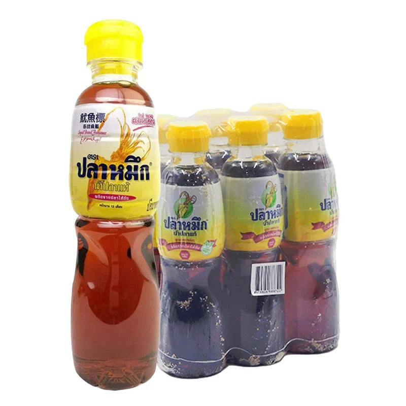 Six 280ml bottles of Squid Brand Fish Sauce in yellow packaging, ideal for Asian cooking and seasoning in dry groceries.