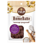 Tulip Home Bake Dark Compound Coins, grocery product, close-up of dark chocolate baking coins with Tulip branding.