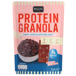 Delalita Protein Granola with dark chocolate in a clear bowl, showcasing crunchy texture and chocolate chunks.