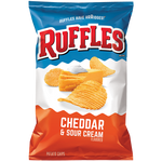 Ruffles Cheddar & Sour Cream potato chips in a bowl, showing ruffled texture and vibrant cheese flavor.
