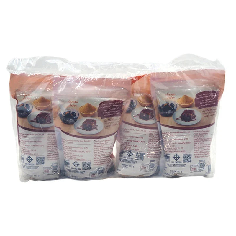 Mitr Phol brown sugar packs, 500g each, in a retail display showing four packages of dry grocery product.