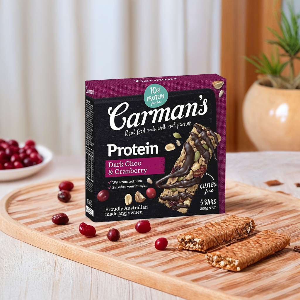 Carman's Dark Chocolate and Cranberry Protein Bar, healthy grocery snack with rich dark chocolate and dried cranberries.