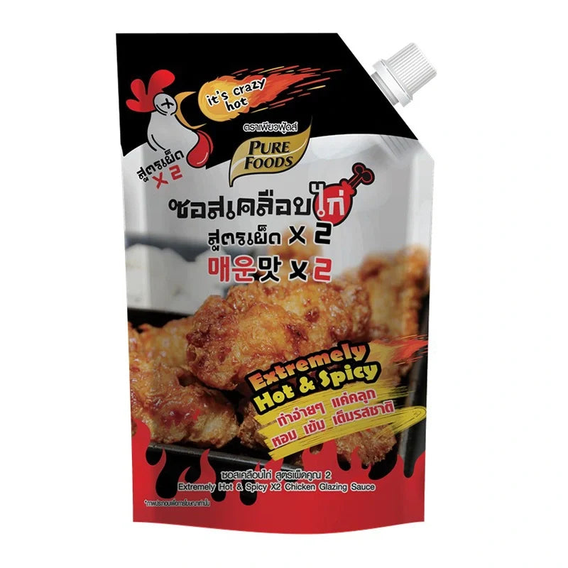 Pure Foods Extra Hot Glazing Sauce 1kg in a jar, showcasing vibrant red chili peppers and glossy texture for spicy flavor.