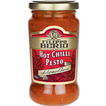 Jar of Filippo Berio Pesto Hot Chilli with visible red chili flakes and basil leaves in a glass jar.