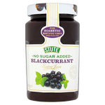 Jar of Stute Blackcurrant Jam showing the label and blackcurrant fruit, highlighting a healthy, natural grocery product.