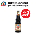 Deksomboon Thick Oyster Sauce 670g bottle, popular dry grocery item with rich, dark sauce in clear plastic bottle.