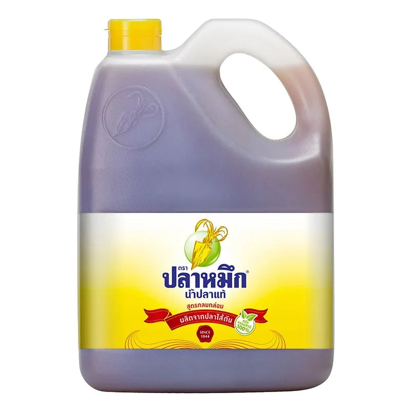 Squid Brand Fish Sauce Yellow 4.5L bottle, traditional Thai fish sauce for cooking and seasoning in dry grocery products.