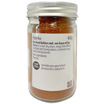 Sainsbury's paprika in a spice jar, vibrant red ground paprika spice from the grocery brand Sainsbury's.