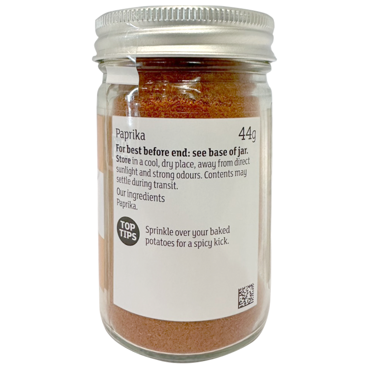Sainsbury's paprika in a spice jar, vibrant red ground paprika spice from the grocery brand Sainsbury's.