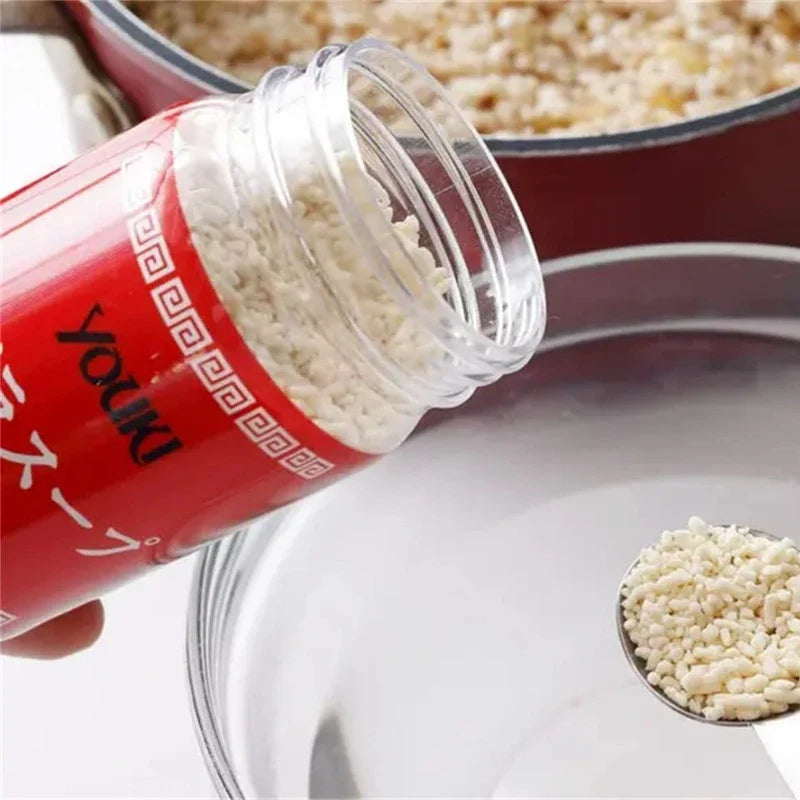 Youki Granule Chicken and Beef Soup Stock bottles, dry grocery, with flavorful chicken and beef extracts in clear bottles.