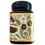 Jar of Kiwi Reserve NZ Monofloral Manuka Honey MGO 265+ with golden honey inside, labeled as a premium grocery product.