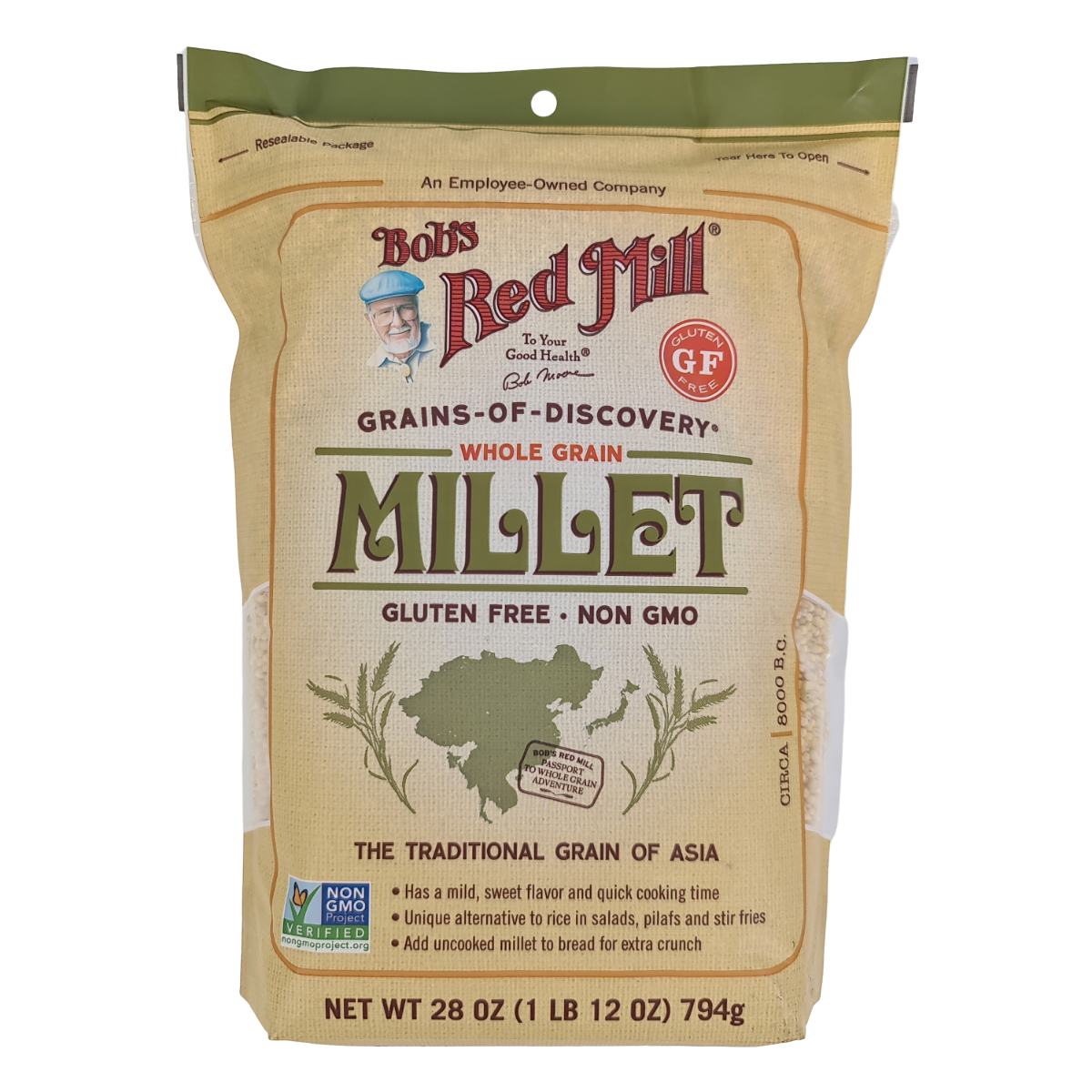Bob's Red Mill hulled millet grains in a clear container, showcasing the light tan, small round cereal for healthy cooking or baking.