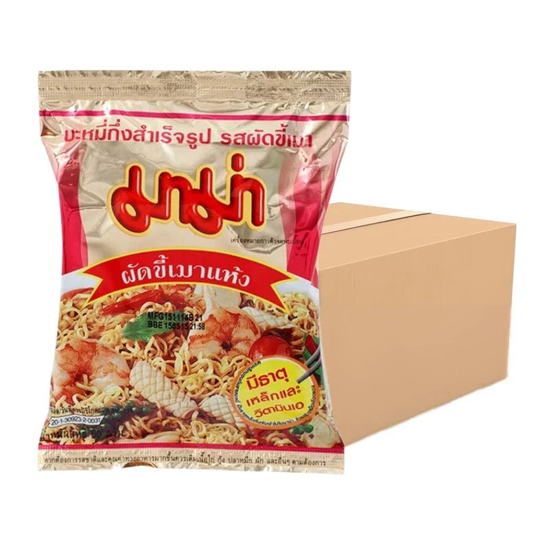 MAMA stir-fried noodles with drunken flavor packets, dry grocery product, cooked and served in a bowl with garnishes