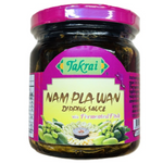 Takrai Fruit Dipping Pla Ra Formula in a jar, showcasing the traditional Thai condiment for fruit dipping.