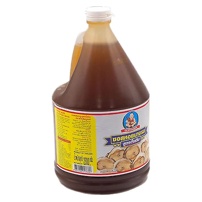 DEK SOM BOON Boon Oyster Sauce 2.3kg bottle, rich savory flavor, ideal for cooking Asian dishes, in a clear plastic bottle.