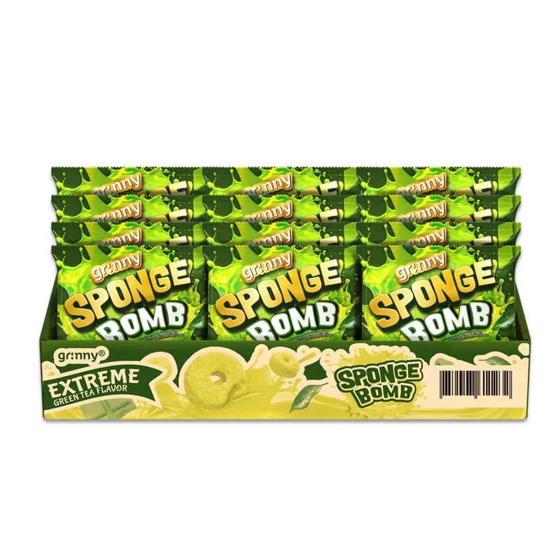 Green tea-flavored Grinny Sponge Bomb Snack, a 15g dry grocery confectionery snack with sponge-like texture and vibrant green color.