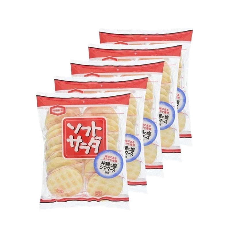 Kameda Seika crispy baked rice cracker with Okinawa Shimamasu flavor, showing golden rice crackers in a close-up view.