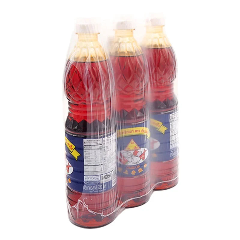 Chua Hah Seng Chili Paste Oil 720ml bottle, dry grocery product, featuring red chili paste with oil in clear packaging
