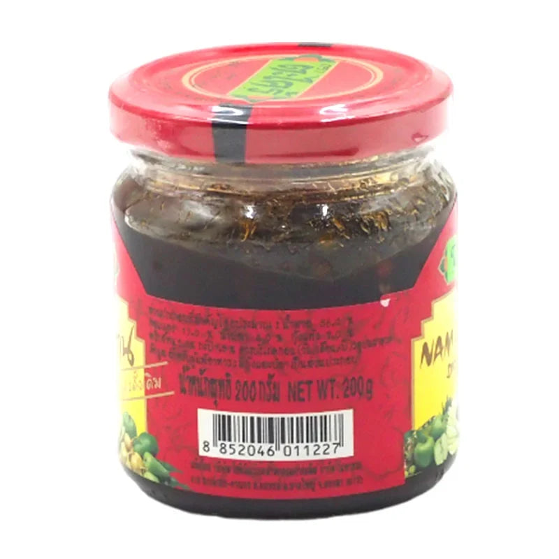 TA Krai Mango Dipping 200g in a clear jar, showcasing the dried mango slices for use as a tasty snack or condiment.
