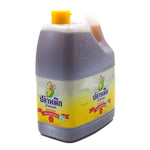 Squid Brand fish sauce in a 4.5L bottle, a yellow-colored dry grocery condiment used in Asian cooking.