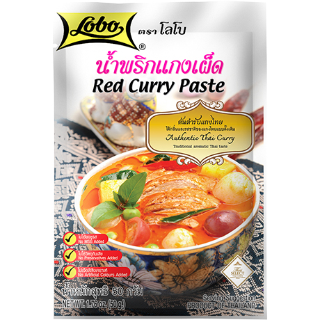 Lobo Red Curry Paste jar from the grocery section, featuring a label with red and white design and the Lobo brand name.